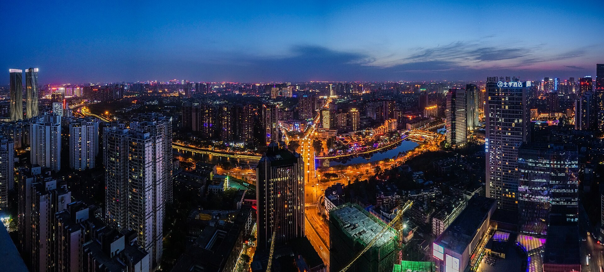 The Jinjiang River waterfront and Chengdu skyline at night