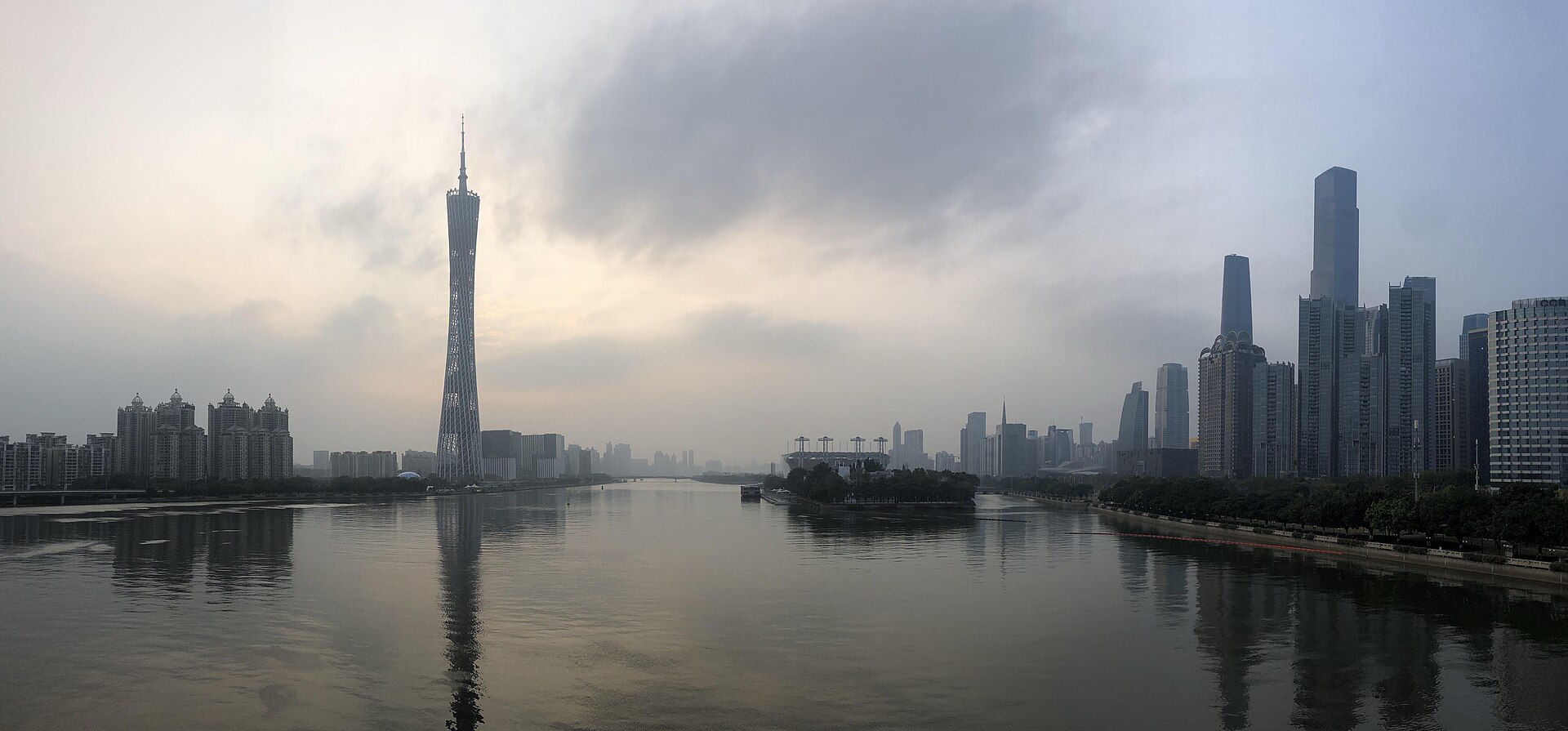 Canton Tower and the Zhujiang New Town towers facing each other across the Pearl River at dawn