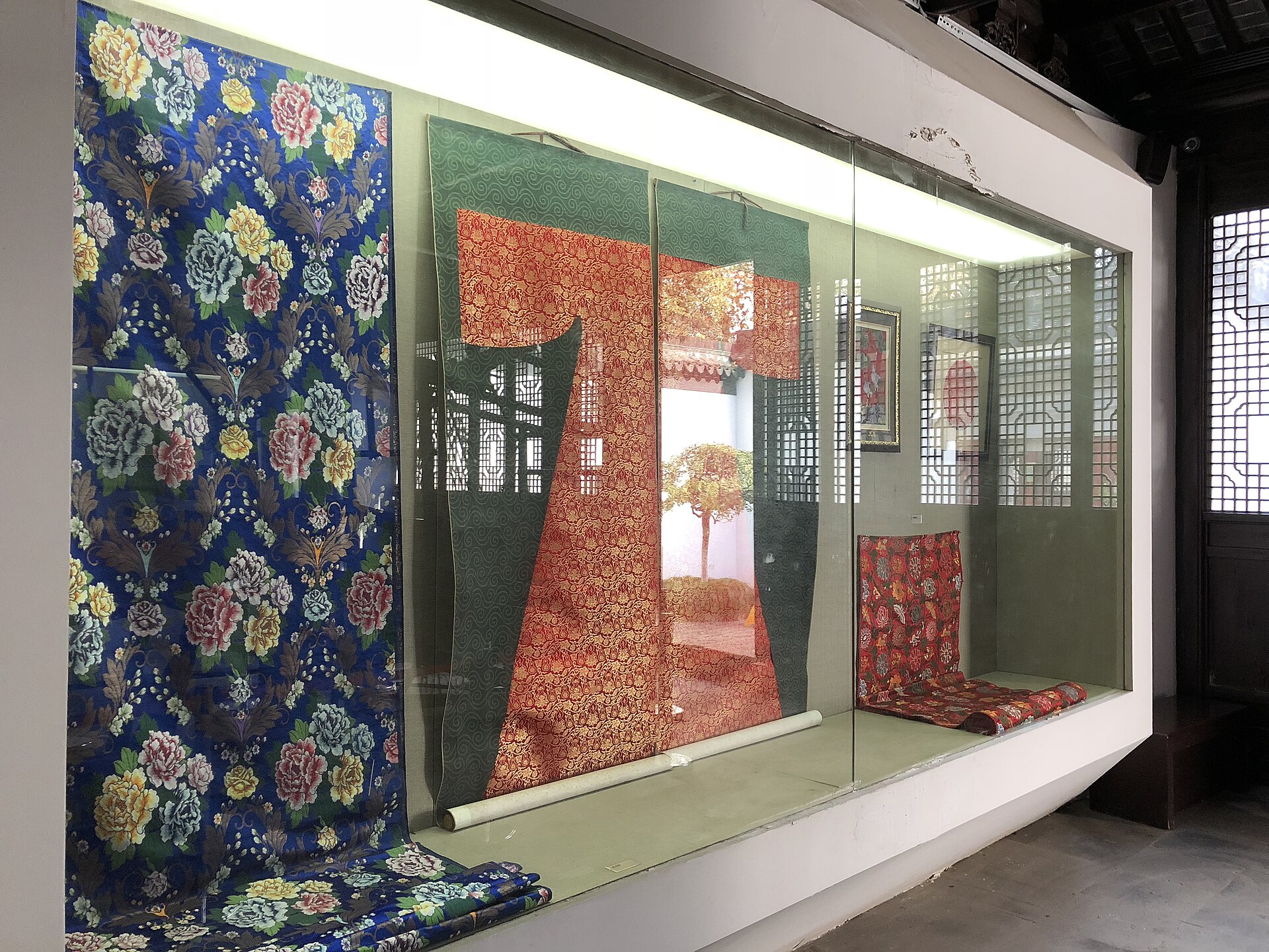 Lengths of Nanjing Yunjin brocade in floral and cloud patterns on display at the Nanjing Folk Museum