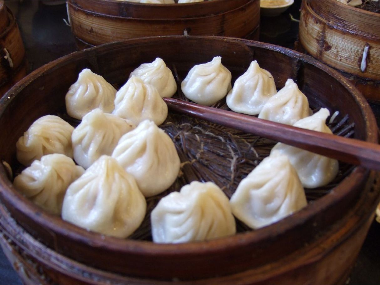 Xiaolongbao in a bamboo steamer at Nanxiang Mantou Dian, Yu Garden