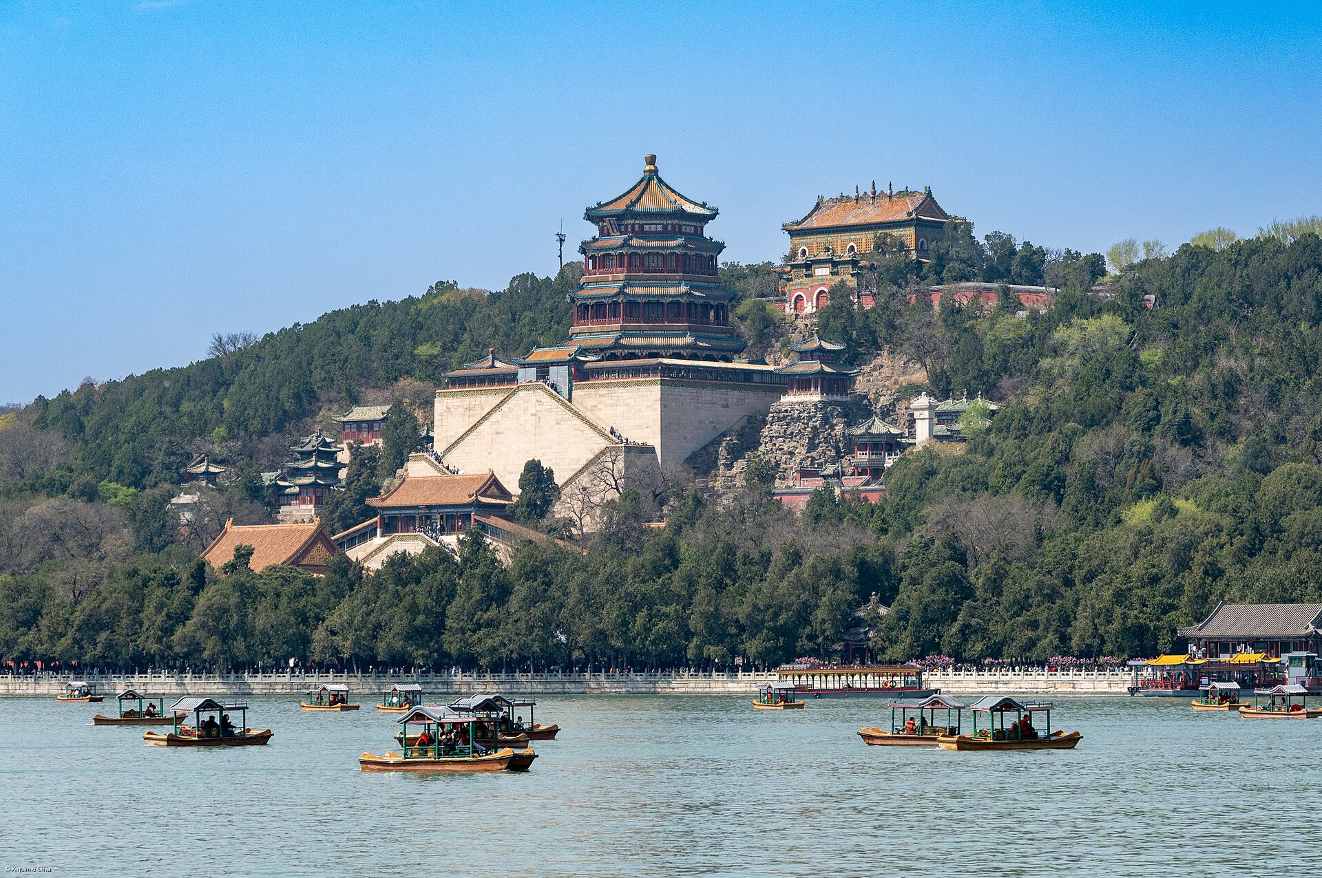 Longevity Hill and the Tower of Buddhist Incense above Kunming Lake at the Summer Palace, with boats on the water