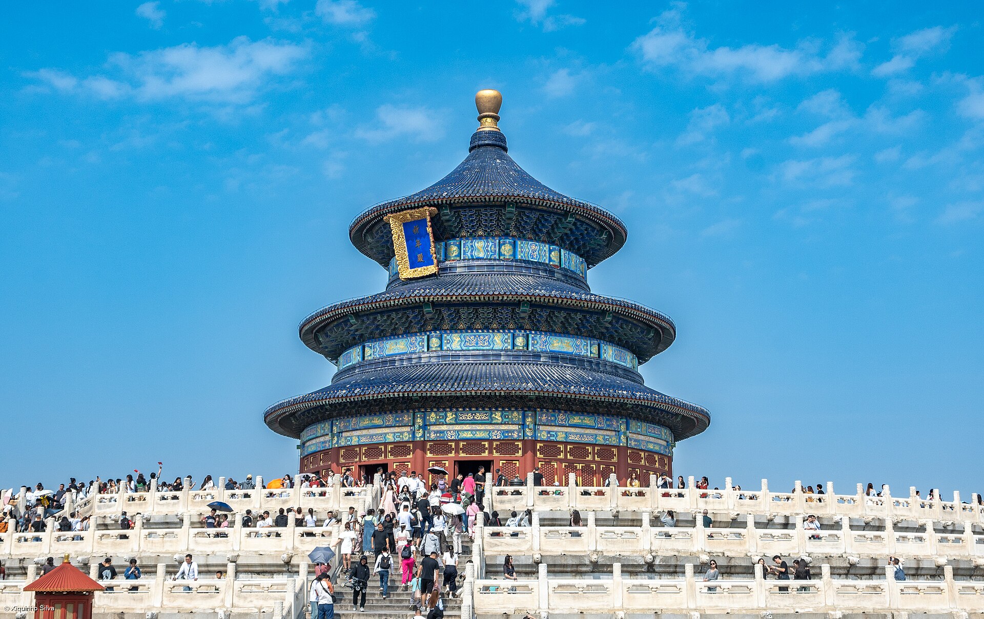 The blue triple-eaved roof of the Hall of Prayer at the Temple of Heaven, above its white marble terraces