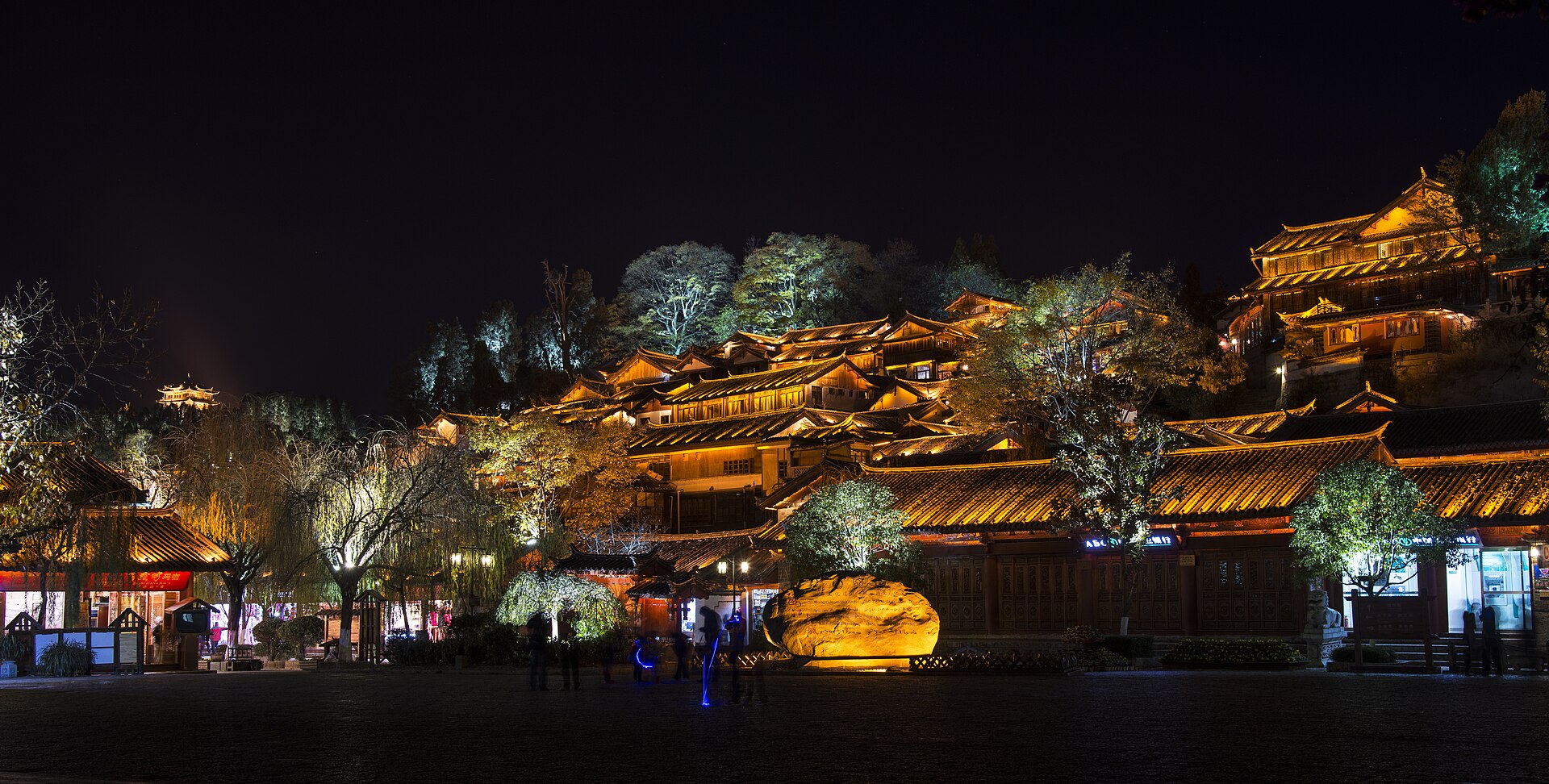 Lijiang old town rooftops lit up at night, Yunnan